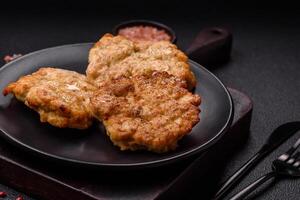 Delicious fried pork or chicken chops breaded with salt and spices photo