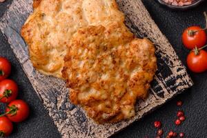Delicious fried pork or chicken chops breaded with salt and spices photo