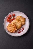 Delicious fried pork or chicken chops breaded with salt and spices photo