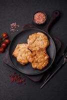 Delicious fried pork or chicken chops breaded with salt and spices photo