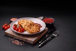 Delicious fried pork or chicken chops breaded with salt and spices photo