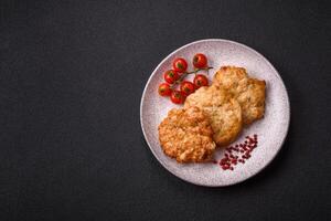 Delicious fried pork or chicken chops breaded with salt and spices photo