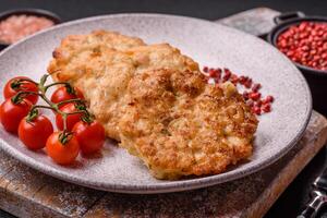 Delicious fried pork or chicken chops breaded with salt and spices photo