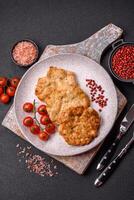 Delicious fried pork or chicken chops breaded with salt and spices photo