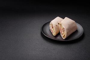 Delicious traditional shawarma or doner kebab with chicken photo