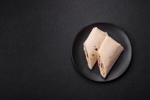 Delicious traditional shawarma or doner kebab with chicken photo