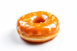 A donut with orange icing on a white background photo