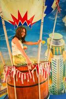 Bangkok, Thailand - 11th february, 2024 - isolated young caucasian woman pose flying on air balloon imitation in Baiyoke Sky Tower photo