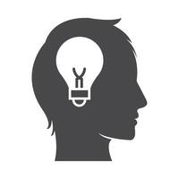 A silhouette of a man's head with an idea light bulb vector