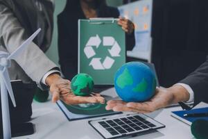 Carbon offset price report CO2 emission. Future growth Net zero waste in ESG ethical SME office protect climate change global warming social issues project. Group of asia people Eco friendly SDGs plan photo