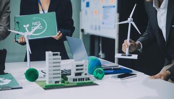 Carbon offset price report CO2 emission. Future growth Net zero waste in ESG ethical SME office protect climate change global warming social issues project. Group of asia people Eco friendly SDGs plan photo