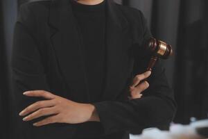 Law theme, gavel or mallet of the judge, lawyer enforcement officers, evidence-based cases taken into account in the court abount business, legislation. photo