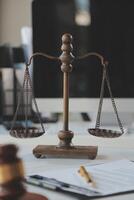 Law theme, gavel or mallet of the judge, lawyer enforcement officers, evidence-based cases taken into account in the court abount business, legislation. photo