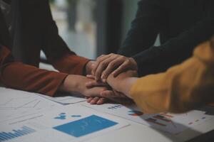 Hand join together for work togetherness, Hand stack for business and service, Team volunteering or teamwork. Concept connection of community and charity. Group of business workforce participation. photo
