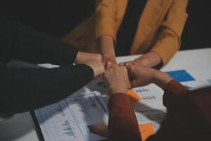 Hand join together for work togetherness, Hand stack for business and service, Team volunteering or teamwork. Concept connection of community and charity. Group of business workforce participation. photo