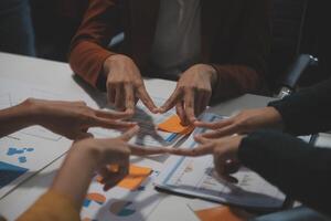 Hand join together for work togetherness, Hand stack for business and service, Team volunteering or teamwork. Concept connection of community and charity. Group of business workforce participation. photo