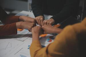 Hand join together for work togetherness, Hand stack for business and service, Team volunteering or teamwork. Concept connection of community and charity. Group of business workforce participation. photo