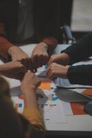Hand join together for work togetherness, Hand stack for business and service, Team volunteering or teamwork. Concept connection of community and charity. Group of business workforce participation. photo
