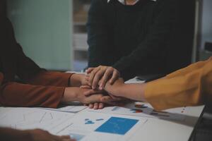 Hand join together for work togetherness, Hand stack for business and service, Team volunteering or teamwork. Concept connection of community and charity. Group of business workforce participation. photo