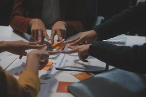 Hand join together for work togetherness, Hand stack for business and service, Team volunteering or teamwork. Concept connection of community and charity. Group of business workforce participation. photo