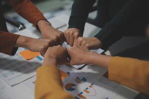 Hand join together for work togetherness, Hand stack for business and service, Team volunteering or teamwork. Concept connection of community and charity. Group of business workforce participation. photo