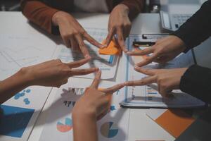 Hand join together for work togetherness, Hand stack for business and service, Team volunteering or teamwork. Concept connection of community and charity. Group of business workforce participation. photo