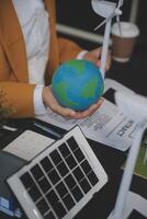 Carbon offset price report CO2 emission. Future growth Net zero waste in ESG ethical SME office protect climate change global warming social issues project. Group of asia people Eco friendly SDGs plan photo