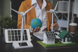 Carbon offset price report CO2 emission. Future growth Net zero waste in ESG ethical SME office protect climate change global warming social issues project. Group of asia people Eco friendly SDGs plan photo