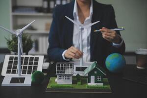 Carbon offset price report CO2 emission. Future growth Net zero waste in ESG ethical SME office protect climate change global warming social issues project. Group of asia people Eco friendly SDGs plan photo