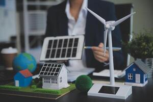 Carbon offset price report CO2 emission. Future growth Net zero waste in ESG ethical SME office protect climate change global warming social issues project. Group of asia people Eco friendly SDGs plan photo
