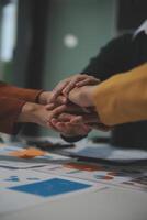 Hand join together for work togetherness, Hand stack for business and service, Team volunteering or teamwork. Concept connection of community and charity. Group of business workforce participation. photo