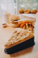 Multiple type of Fast food on table. photo