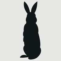 silhouette of a rabbit standing up on a white background vector