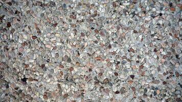 pebble stone texture background, soft stone surface. photo