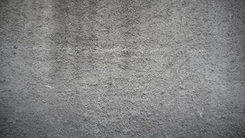 Texture of grey concrete wall for construction background. Blank plaster texture in vintage style. photo