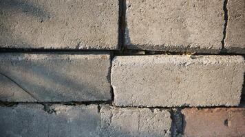 Background of brick wall texture. Abstract geometric pattern texture, Classic outdoor building granite blocks wall. photo