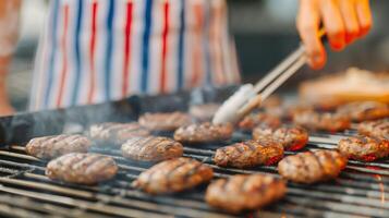 Grilling Burgers on Barbecue Grill During Backyard Summer Cookout with Patriotic Apron 4th of July BBQ photo