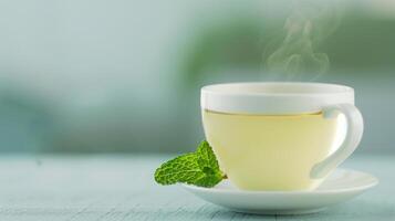 A Steaming Cup of Herbal Tea with a Sprig of Fresh Mint Soft Blue Wooden Surface, Relaxation and Wellness Isolated Close-up with Gentle Lighting Space for Text Comfort and Refreshment-Themed Projects photo