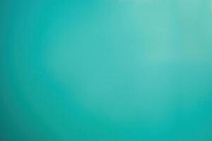 Soft turquoise background with slight texture and gradient in natural light photo