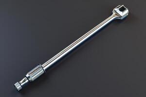 Shiny metal wrench on a dark background with a smooth surface photo