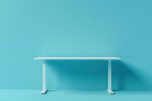 Minimalist standing desk against a bright blue wall in a modern workspace photo