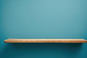 Minimal wooden shelf against a blue wall in a modern interior setting photo