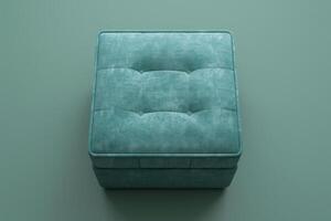 Soft teal ottoman with tufted design on a minimalist background photo