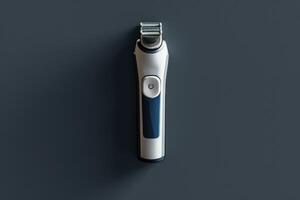 Modern hair clippers on a dark surface with a sleek design and simple button photo