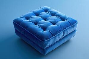 Soft blue upholstered cushion on a smooth blue background photo
