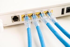 Ethernet cable with wireless router connect to internet service provider internet network. photo