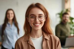Office workers smiling and engaging positively while collaborating together photo