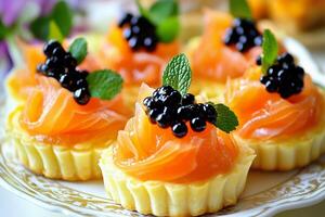 Gourmet canapes with smoked salmon and caviar. Elegant appetizers served at celebratory event. photo