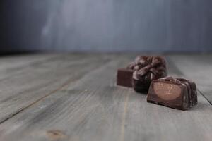 Chocolate candy in a cut. Homemade chocolate truffle filled candies with space for text and copyspace. How to choose a candy photo