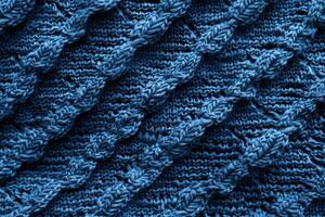 A smooth blue tricot texture creates a subtle and elegant background photo
